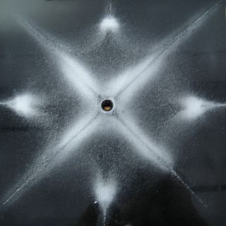 cymatics image: salt on metal