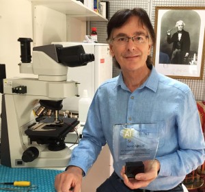 John Stuart Reid holds Cymatics Award 2017